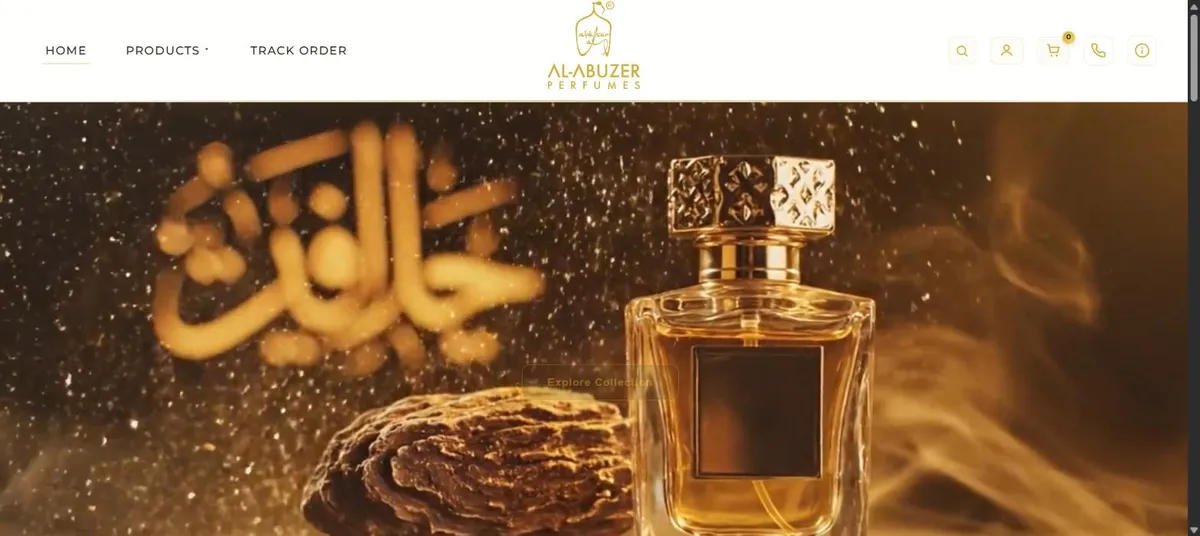 Al-Abuzer Perfumes homepage: a gold perfume bottle and Arabic calligraphy in drifting gold dust, under a navigation bar with Products, Track Order, search, account and cart.